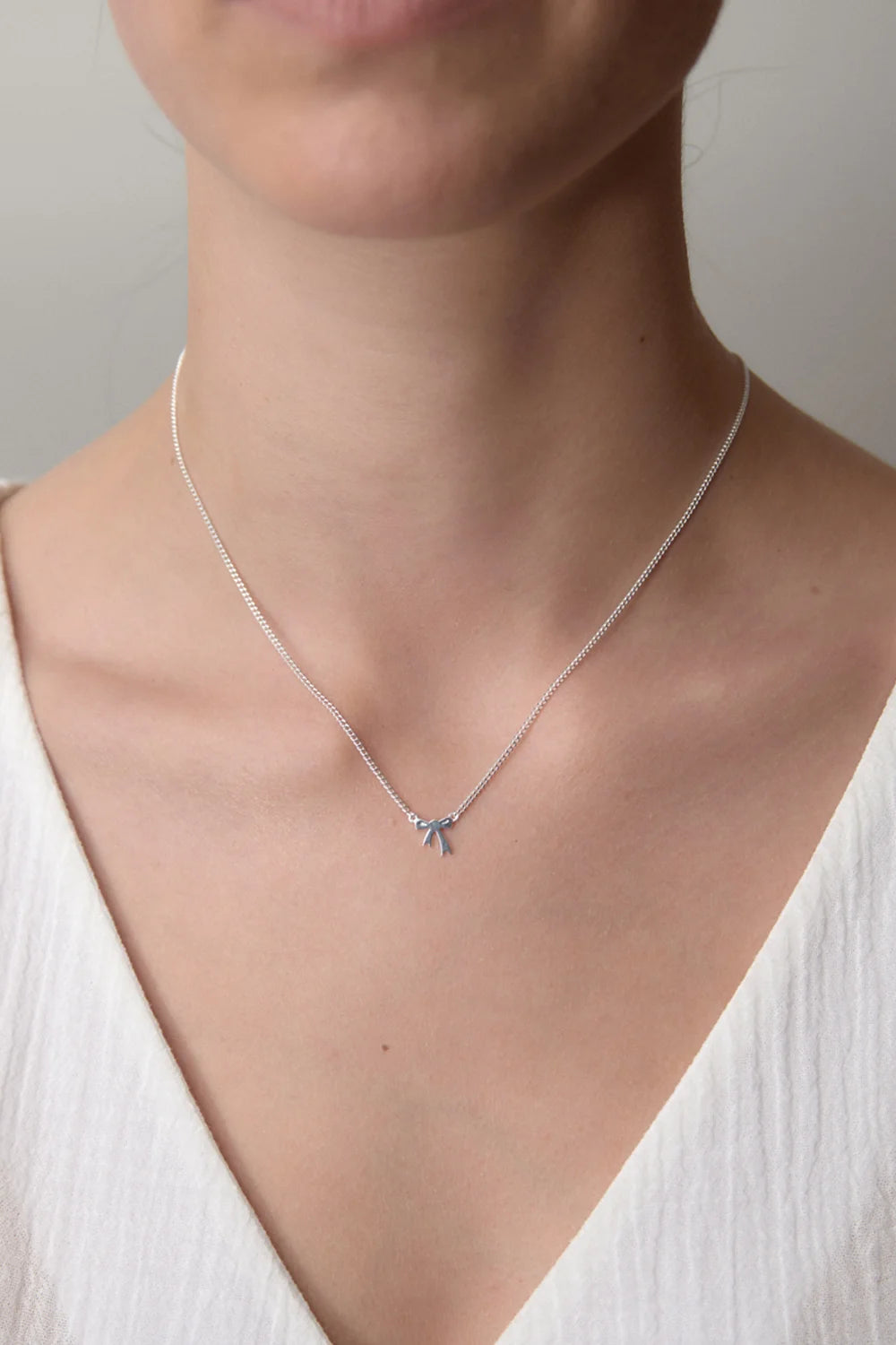 MINI BOW NECKLACE