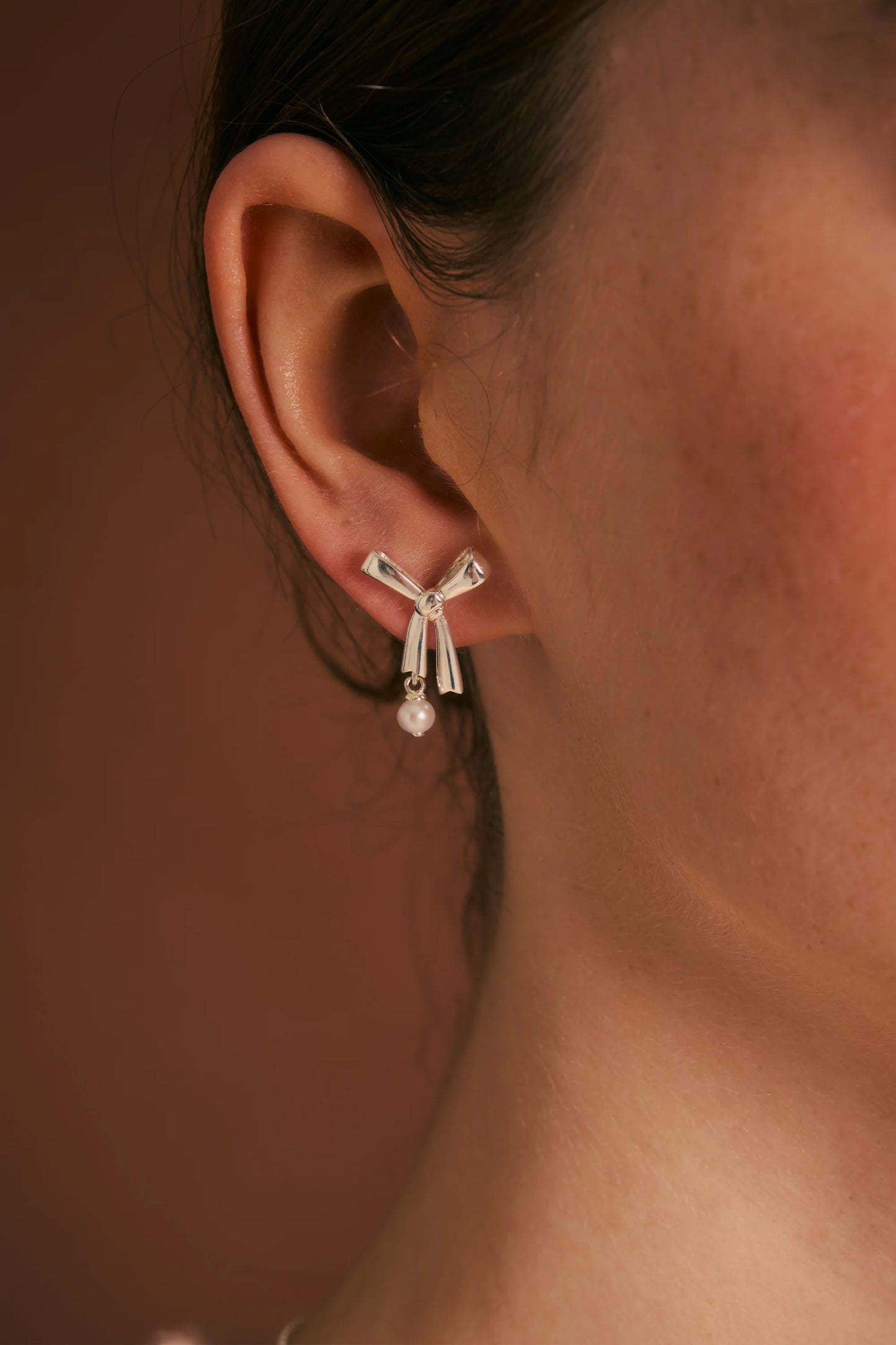 PEARL BOW STUDS