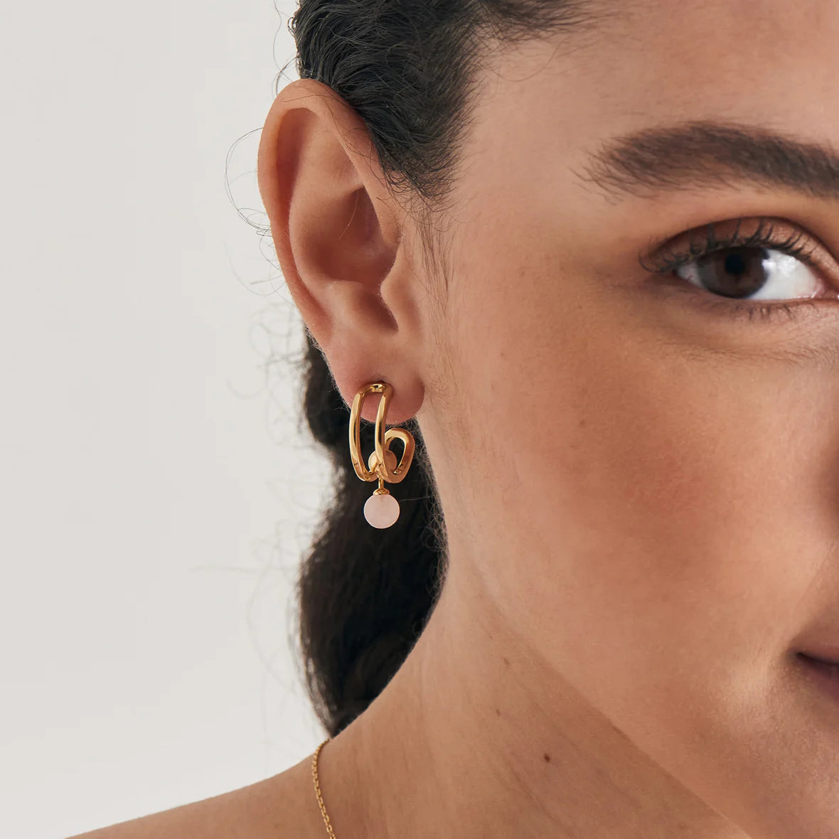 SPACED ORB ROSE QUARTZ MINI HOOP EARRINGS