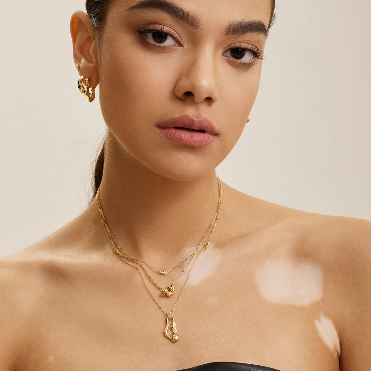 TWISTED WAVE DROP PENDANT NECKLACE