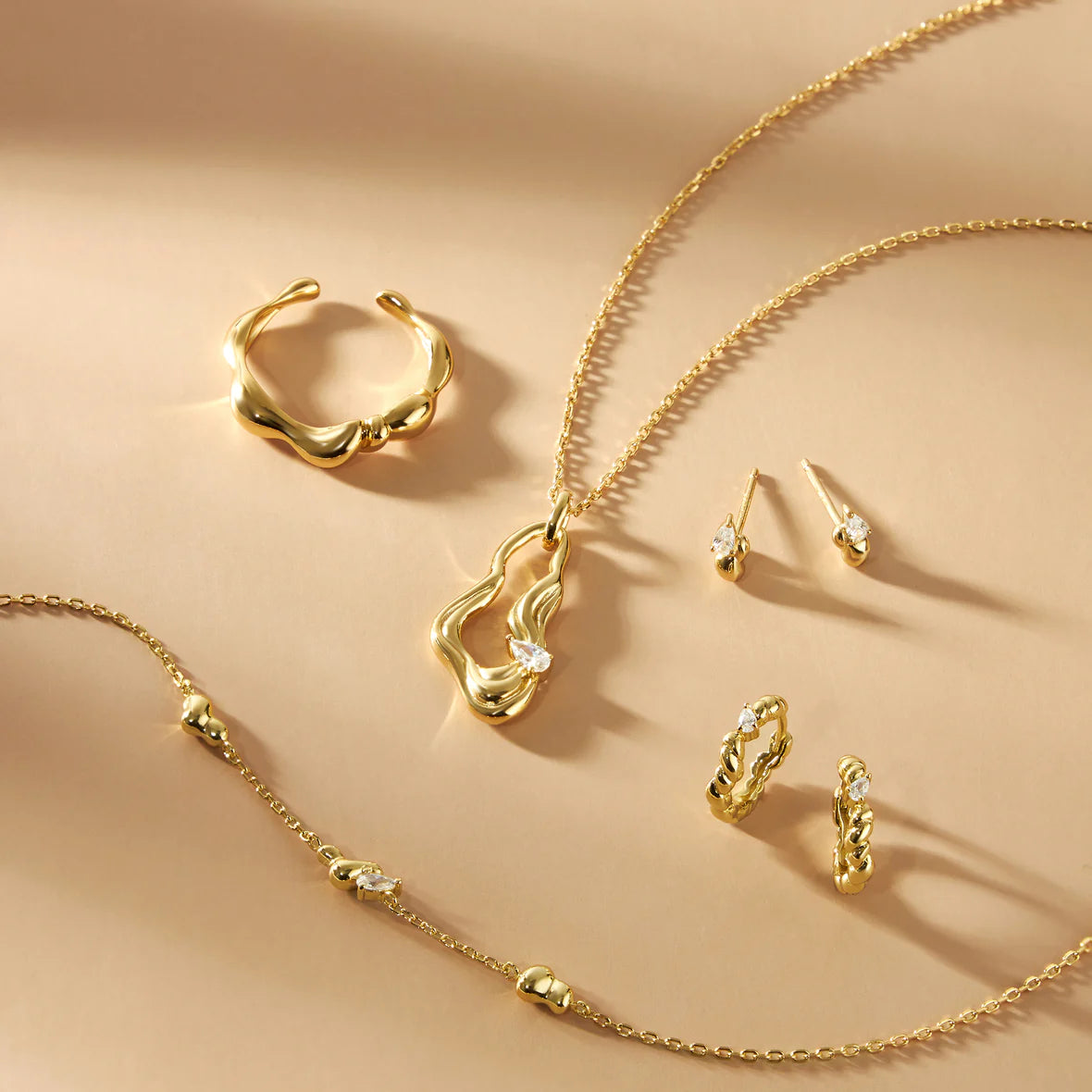 TWISTED WAVE DROP PENDANT NECKLACE
