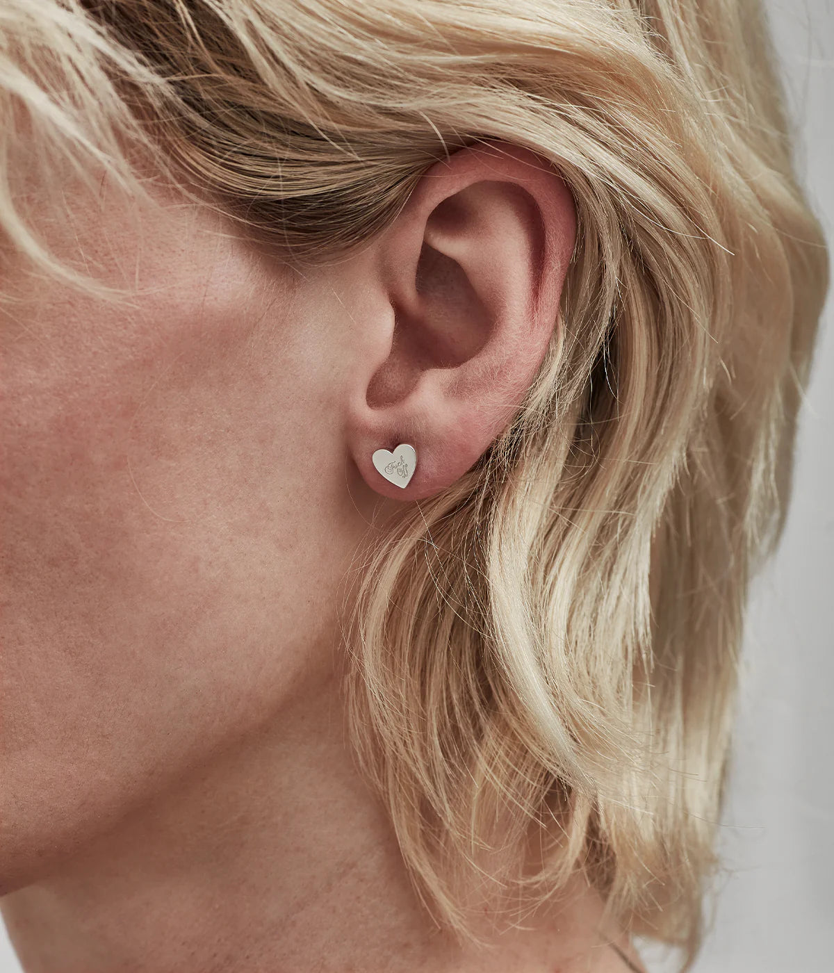 WARM WELCOME HEART STUDS